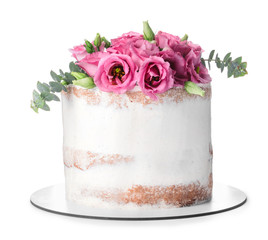 Sweet cake with floral decor on white background