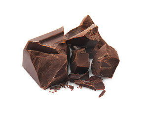 Pieces of tasty dark chocolate on white background