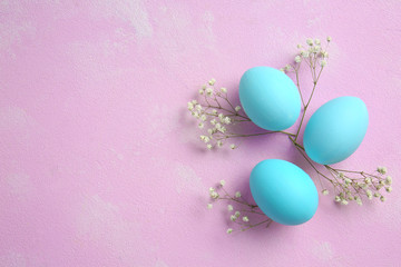 Fototapeta na wymiar Beautiful Easter eggs on color background