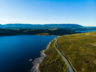 Road crossing Hardangervidda plateau, Norway. Aerial view.