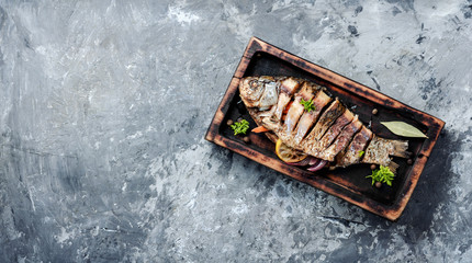Carp stuffed with vegetables