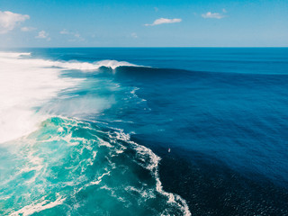 Aerial view with big blue wave for surfing. Big waves in ocean