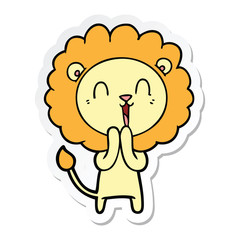 sticker of a laughing lion cartoon