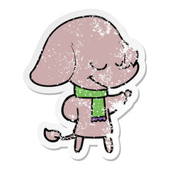 distressed sticker of a cartoon smiling elephant wearing scarf