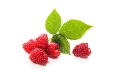 Ripe raspberries with leaf isolated on white background.