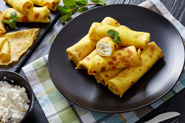 crepes roll up filled with sweet white cheese