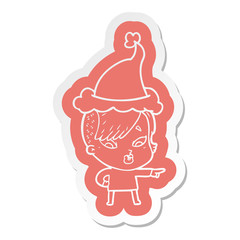 cartoon  sticker of a surprised girl pointing wearing santa hat