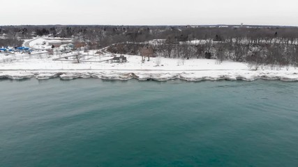 Michigan lake in Winter. Water, cold weather, bird's eye view, drone shots