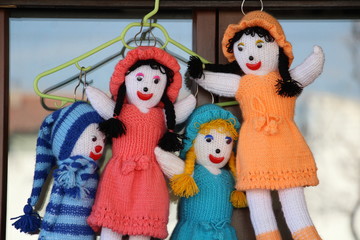 Hand knitted cute toy babies. 