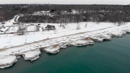Michigan lake in Winter. Water, cold weather, bird's eye view, drone shots