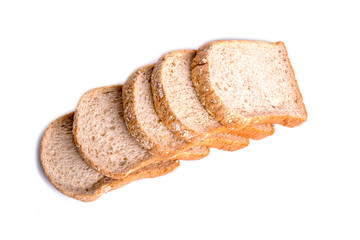 Slice whole wheat bread isolated on white background.
