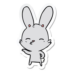 sticker of a curious bunny cartoon