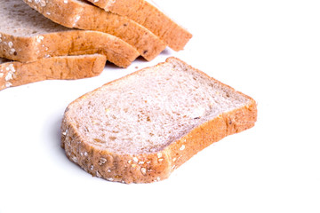 Slice whole wheat bread isolated on white background.