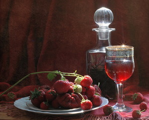 Cold strawberry drink on wooden table