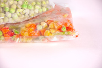 Frozen vegetables in a plastic bag. Healthy food storage concept.