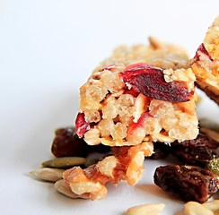 muesli bar with nuts and fruits on a table mat