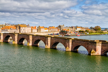 The River Tweed and Berwick Old Bridge, Berwick-upon-Tweed, Northumberland, England, UK. The city...