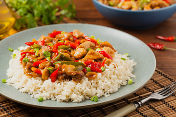 Chicken kung pao. Fried chicken pieces with peanuts and peppers.