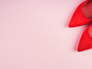 Monochrome background with red woman's shoes