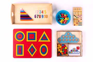 Montessori wood material for the learning mathematics of children at school, preschool,kindergarten. Educational concept. Flat lay.