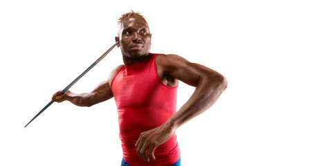 Young black male javelin thrower throwing a spear on white background. Isolated athlete in sport...