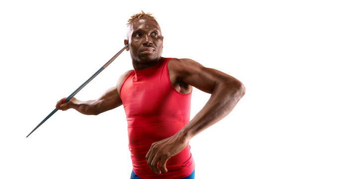 Young black male javelin thrower throwing a spear on white background. Isolated athlete in sport clothes