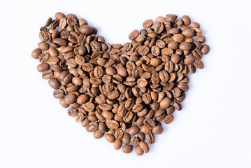 Coffee bean heart decoration on white background