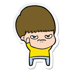 sticker of a annoyed cartoon boy