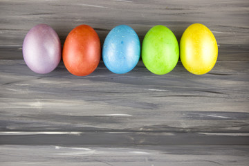 Easter eggs on wooden background. Dyed Easter eggs.
