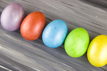 Easter eggs on wooden background. Dyed Easter eggs.