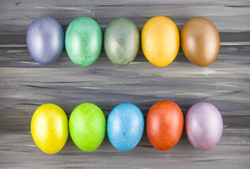 Easter eggs on wooden background. Dyed Easter eggs.
