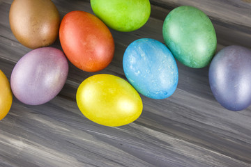 Easter eggs on wooden background. Dyed Easter eggs.