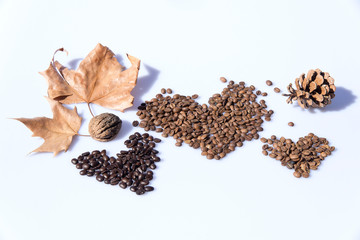 Coffee bean heart decoration on white background
