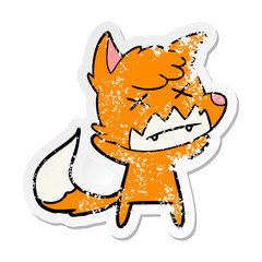 distressed sticker of a cartoon cross eyed fox