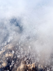 Obraz premium Aerial view of frost trees through the clouds, near Volga river, Samara, Russia.