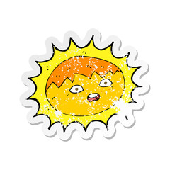 retro distressed sticker of a cartoon sun