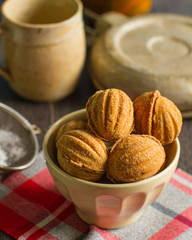 Russian walnut shaped cookies with caramely filling – “Oreshki”