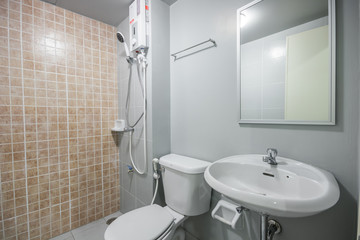 Bathroom with shower and facility of hotel interior 