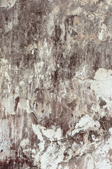 Cracked and peeling paint old wall background.