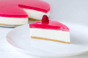 Homemade cheesecake with fresh raspberries and mint for dessert - healthy organic summer dessert pie cheesecake. Vanilla Cheese Cake.