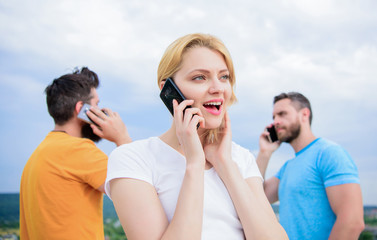 The easiest way to communicate. Mobile phone users. Group of friends talking on cell phones. Modern people with smartphones outdoor. People and technology. Using mobile communication technology