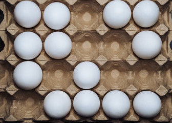 Box of white chicken eggs. Close-up. Organic village eggs
