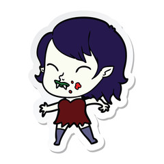 sticker of a cartoon vampire girl with blood on cheek