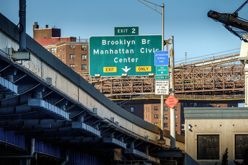 Brooklyn bridge exit sign on highway.