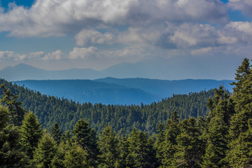 mountain forest wallpaper background pattern picturesque dramatic scenery nature landscape in north European country foggy weather aerial photography, copy space