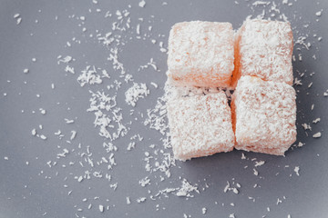 Turkish delight on gray plate top view