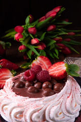 light pavlova with fresh fruits and chocolate