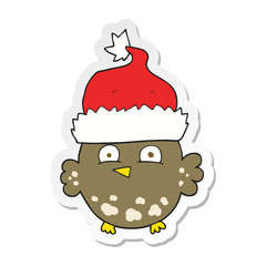 sticker of a cartoon owl wearing christmas hat