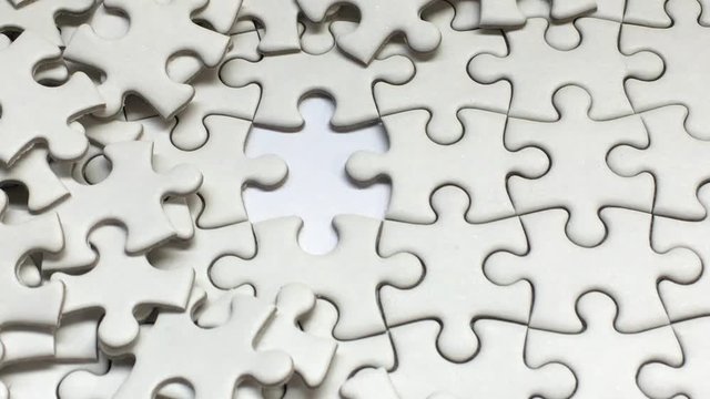 Take out White Jigsaw Puzzle piece with white background, Succeed in Business concept, Debt settlement concept.