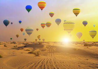Hot air balloons sunset sand desert